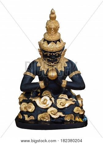 Buddha and Rahu sculptures at Buddhist shrine in Thailand. Hindu deities black.