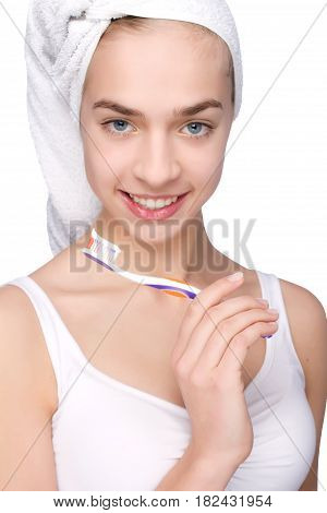 Beautiful Young Woman With Toothbrush In Her Hands