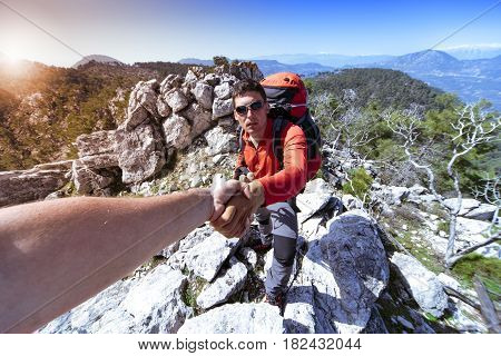 Help support and help in a dangerous situation to hike in the mountains.