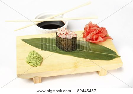 Japanese poppies with eel, salmon, flying fish roe, shrimp and ginger isolated on white background