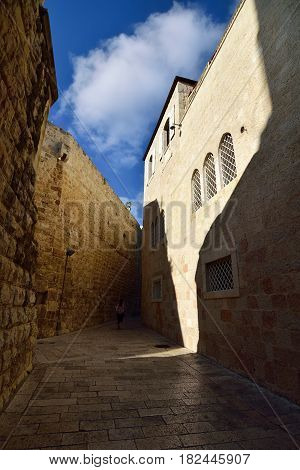 Narrow streets in medieval residential district in old Jerusalem.