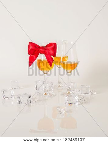 Set Of Single Malt Tasting Glasses, Single Malt Whisky In A Glasses, White Background, Red Bow