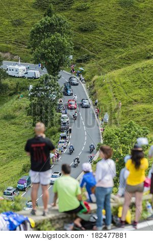 Col de PeyresourdeFrance- July 23 2014: The cyclists Vasili Kiryienka (Team Sky ) climbing as a leader the road to Col de Peyresourde in Pyrenees Mountains during the stage 17 of Le Tour de France on 23 July 2014.