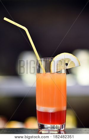 glass of cocktail on bar