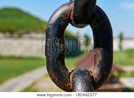 Rusty old chain of ancient fortress in Dubno, Ukraine
