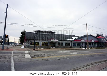 KALKASKA, MICHIGAN / UNITED STATES - NOVEMBER 27, 2016: One may obtain a loan at Quick Cash on Cedar Street in downtown Kalkaska.