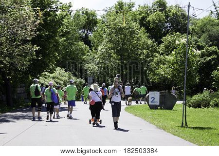 Laval, Quebec - June 14, 2015 -- Wide view of a large group of walkers participating in the 