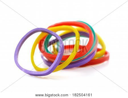 Top view of colorful rubber bands isolated on white Elastic bands on a white