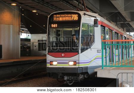 HONG KONG - NOVEMBER 11, 2016: Light Rail Transit LRT train. LTR is a light rail system in Hong Kong, serving the New Territories West, within Tuen Mun District and Yuen Long District.