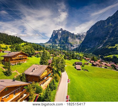 Colorful morning view of Grindelwald village valley from cableway. Wellhorn mountain located west of Innertkirchen in the Bernese Oberland Alps. Switzerland Europe.