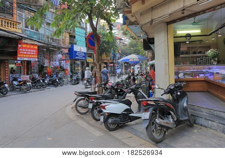 HANOI VIETNAM - NOVEMBER 22, 2016: Unidentified people visit Hang Bac shopping street. Hang Bac street is famous for jewellery shopping.