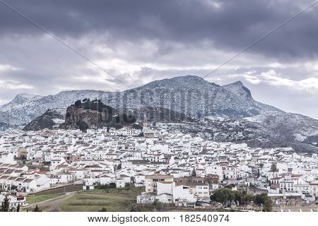 View to the beautiful town placed in the mountains in cloudy day. Ardales Malaga Spain