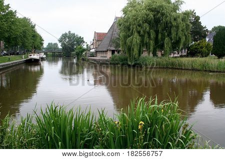 Friesland Franeker july 2016: Farmhousein the town of Franeker