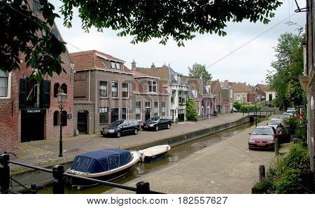 FrieslandFranekerjuly 2016: Canal in the town of Franeker