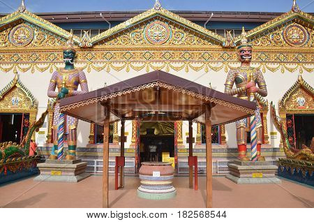 Statue Standing Outside Wat Chayamangkalaram Located In Penang