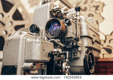 Retro style vintage metal film projector, movie equipment of last century