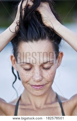 Portrait of sensual woman with freckles, clouse up