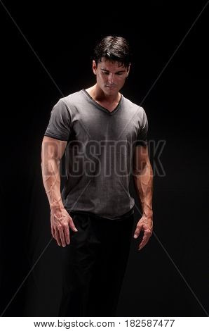 The cute guy has muscles all over him.