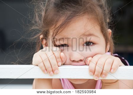 Portrait of sad mix asian girl. Loneliness