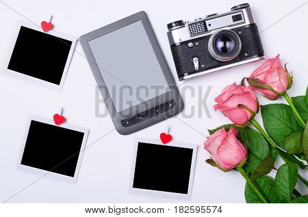 Romantic Concept: Roses, Retro Camera, Tablet And Cards.