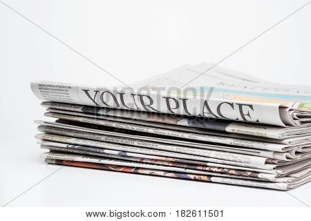 Close up of a stack of folded newspapers The Wall Street Journal and Chicago Tribune(for editorial use only)