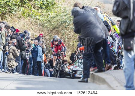 Conflans-Sainte-HonorineFrance-March 62016: The Belgian cyclist Ben Hermans of BMC Racing Team riding during the prologue stage of Paris-Nice 2016.