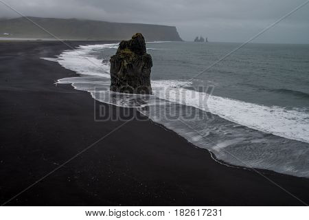 Rocks of Dyrholaey and the sea in Iceland