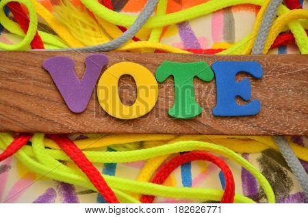 word vote on a  abstract colorful background