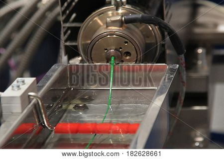 Plastic Wire Filament the Modern printing technology. Continuous extrusion with cooling in water.