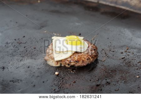 Appetizing meat roasted on skewers BBQ grill. Grilled meat. Grilled meat on food festival. Food fair suggest delicious meat cooked on bbq.