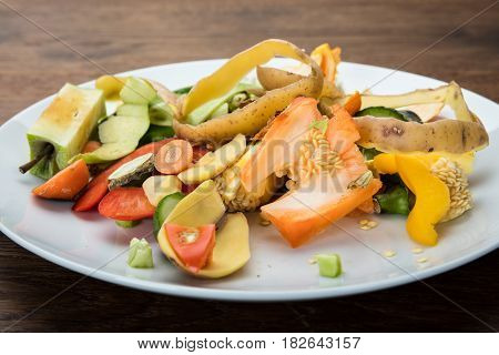 Waste Based Cooking. Vegetables And Fruit Peelings On White Plate