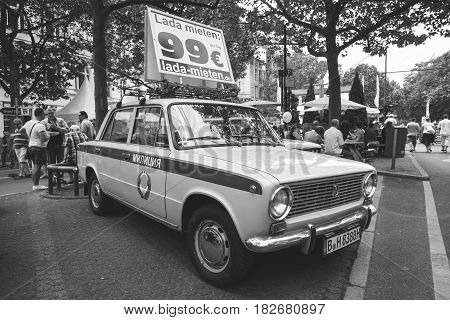 BERLIN - JUNE 05 2016: The popular Soviet car VAZ 2101 in the colors of the traffic police of the USSR. Black and white vintage style. Classic Days Berlin 2016.
