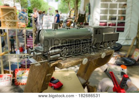 BERLIN - JUNE 05 2016: Souvenir sales of point on the Kurfurstendamm. The toy steam locomotive handmade. Classic Days Berlin 2016