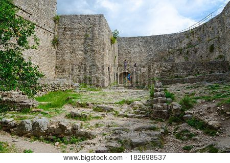 BAR MONTENEGRO - SEPTEMBER 24 2015: Unknown tourists climb stairs to walls of ancient Citadel in Old Bar Montenegro