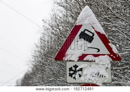 traffic signs and snow