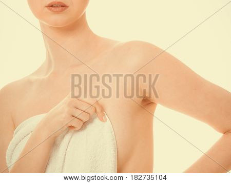 Woman Covering Breast Under Towel.