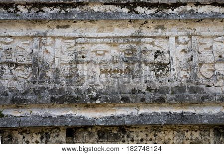 Old Mayan Symbol Gravings In Stone At Chichen Itza Mexico
