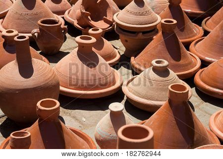 Traditional pottery being sold in a souk in the Medina of Marrakech Morocco
