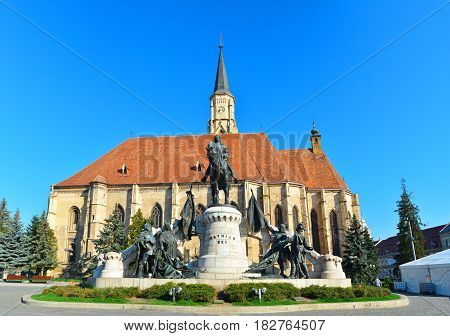 Cluj Napoca city Romania Statue of Matei Corvin and Saint Michael Church