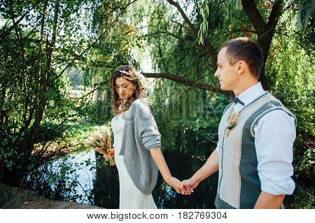 Happy Couple Walking In Summer Park