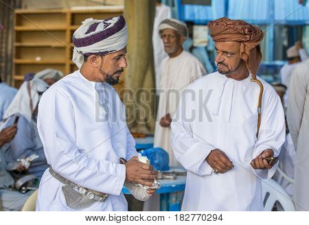 Men At A Market In Nizwa