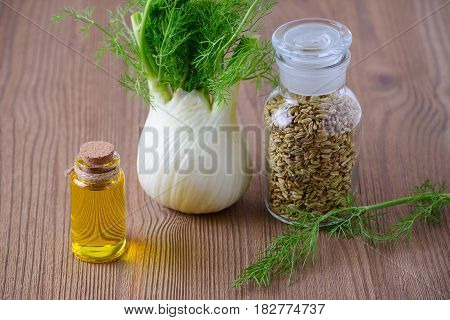 fennel essential oil bulb and seeds selective focus