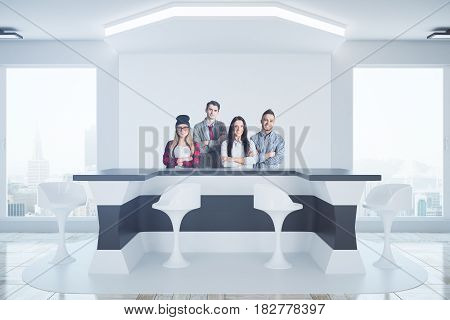 Young european team standing at reception desk in modern interior with city view. Teamwork concept. 3D Rendering