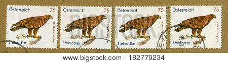 GOMEL, BELARUS, APRIL 20, 2017. Stamp printed in Austria shows image of  The Aquila chrysaetos, circa 2010.
