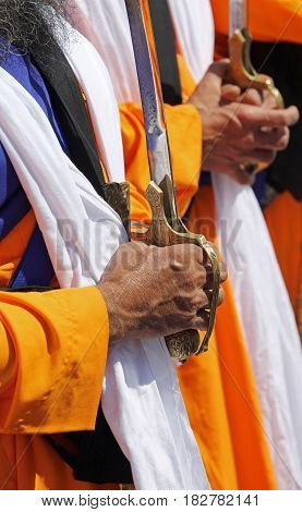 Hands Of The Sikh Religious Men During The Ceremony