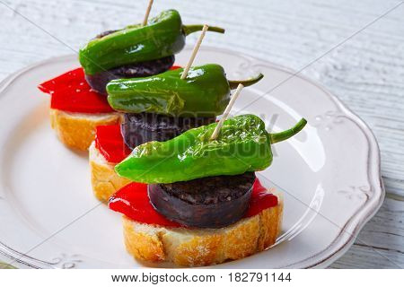 pinchos Burgos morcilla with padron pepper tapas pintxos from Spain food