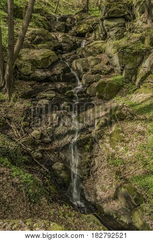 Waterfall near Moravany village in spring green day