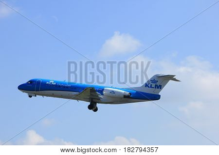 Amsterdam the Netherlands - April 2nd 2017: PH-KZM KLM Cityhopper Fokker F70 takeoff from Polderbaan runway Amsterdam Airport Schiphol