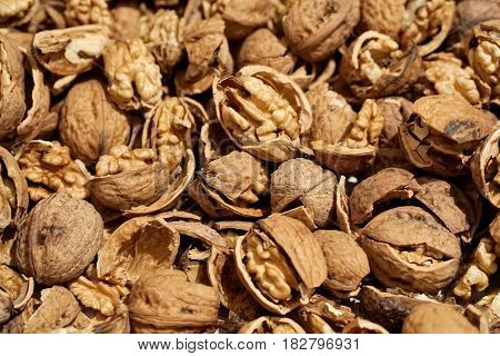 Close view detail of some cracking walnuts