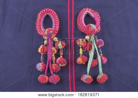 Colorful Tassel And Hmong hilltribe Handmade with selective and soft focus.